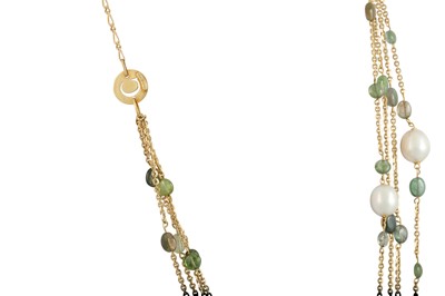 Lot 79 - A FOUR ROWED GREEN TOURMALINE AND PEARL...