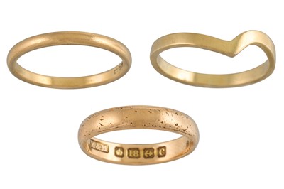 Lot 18 - THREE GOLD BAND RINGS, 2 x 18ct gold and 1 x...
