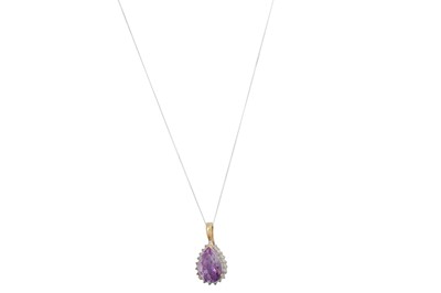 Lot 36 - A DIAMOND AND AMETHYST PENDANT, the large pear...