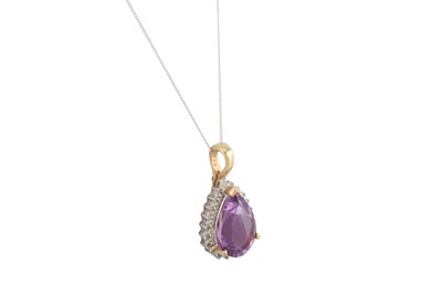 Lot 36 - A DIAMOND AND AMETHYST PENDANT, the large pear...