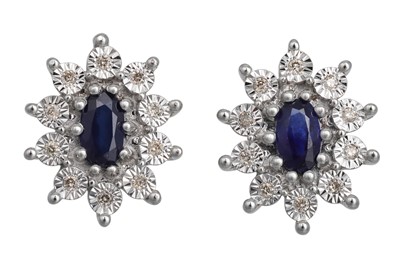 Lot 77 - A PAIR OF DIAMOND AND SAPPHIRE CLUSTER...