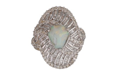 Lot 79 - A DIAMOND AND OPAL CLUSTER RING, the baroque...