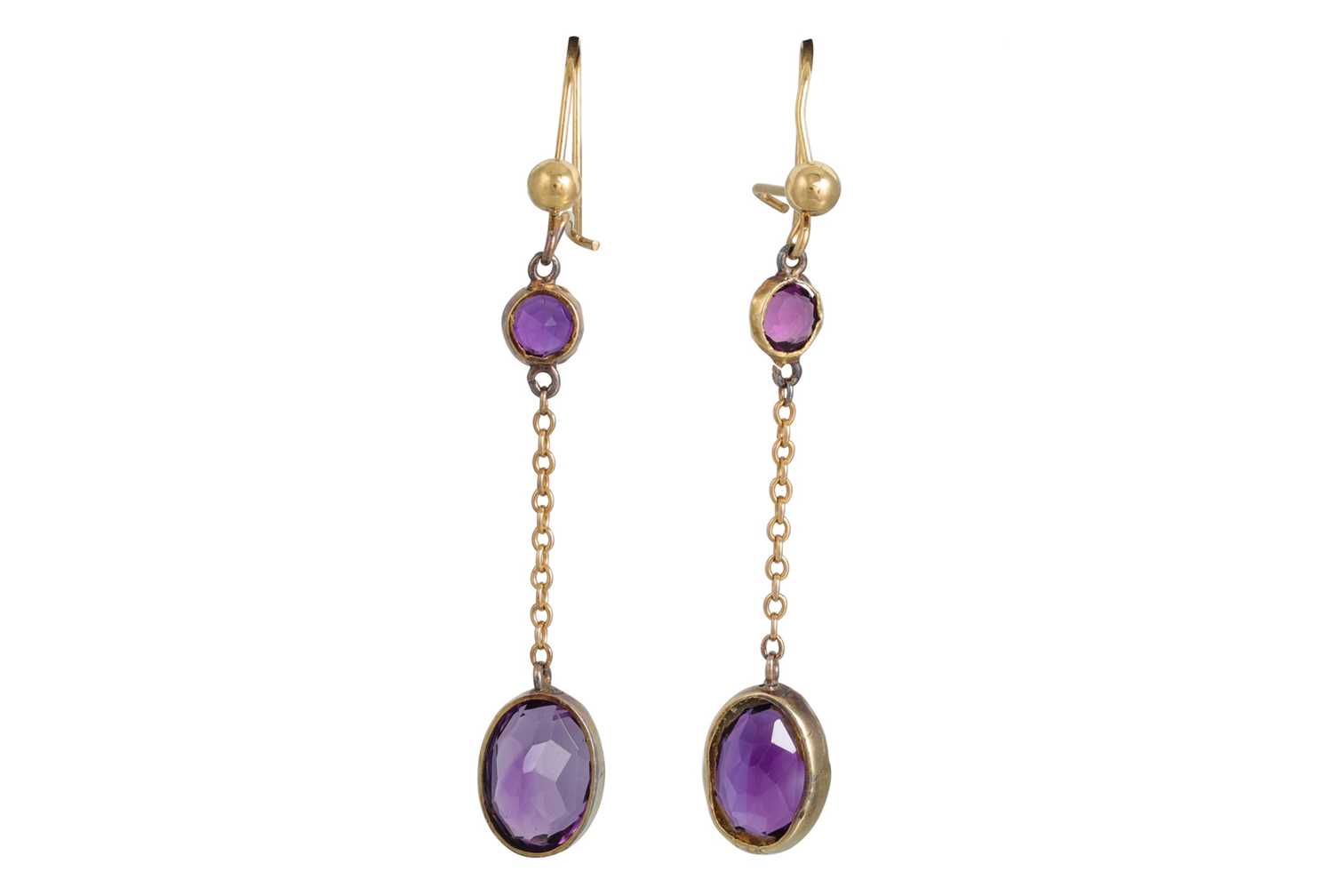 Lot 82 - A PAIR OF AMETHYST DROP EARRINGS, the oval...
