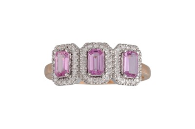 Lot 84 - A DIAMOND AND PINK SAPPHIRE CLUSTER RING, the...