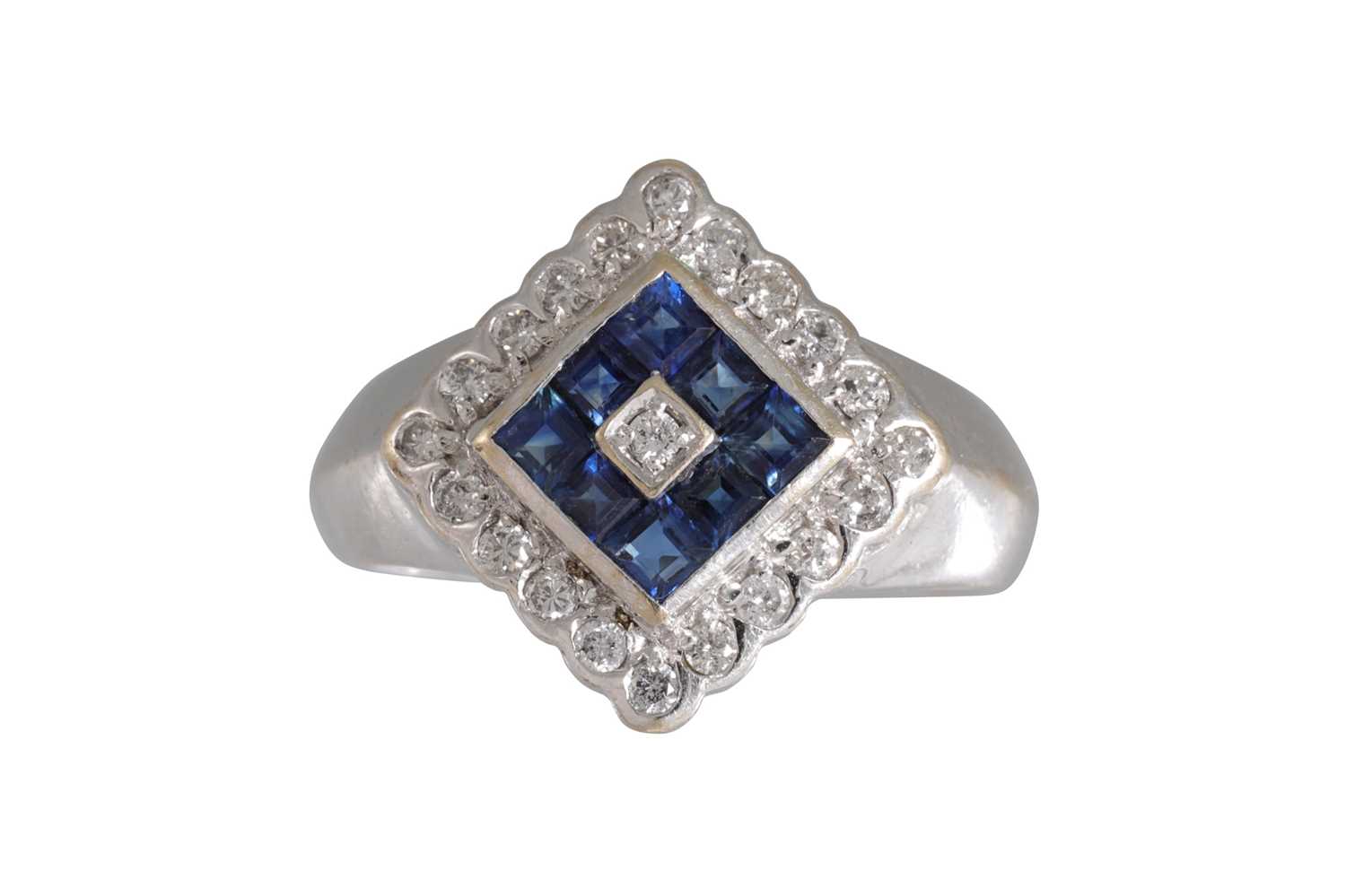 Lot 89 - A DIAMOND AND SAPPHIRE CLUSTER RING, of square...