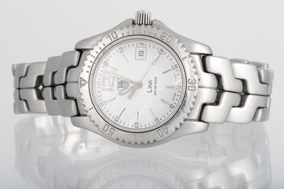 Lot 415 - A GENT'S MID SIZE TAG HEUER WRIST WATCH, white...