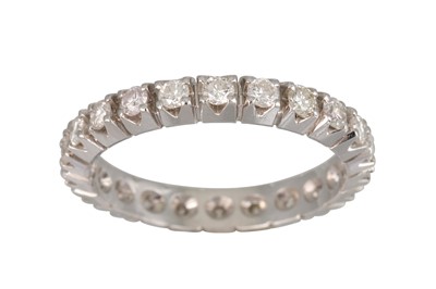 Lot 417 - A DIAMOND ETERNITY RING, the brilliant cut...