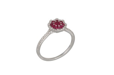 Lot 153 - A RUBY AND DIAMOND CLUSTER RING, the circular...