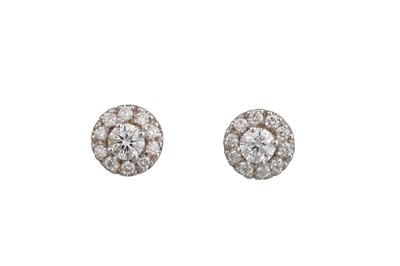 Lot 191 - A PAIR OF DIAMOND CLUSTER EARRINGS, mounted in...