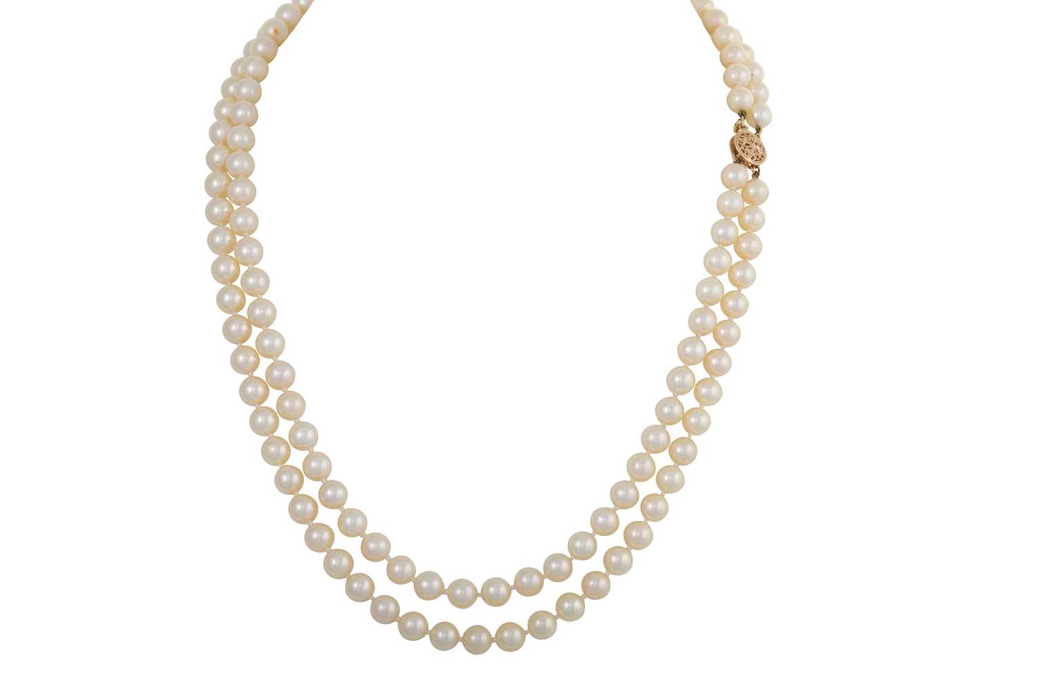 Lot 120 - A TWIN ROW SET OF PEARLS, with a 14ct gold...