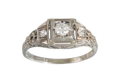 Lot 181 - AN ART DECO STYLE DRESS RING, set with a...