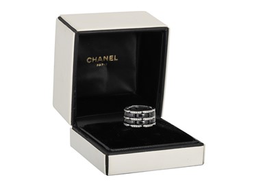 Lot 73 - A CHANEL 'ULTRA' BLACK CERAMIC RING, mounted...