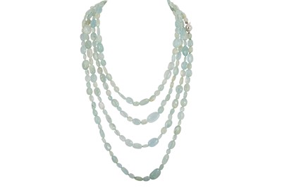Lot 60 - A LONG AQUAMARINE BEADED NECKLACE, to a 18ct...