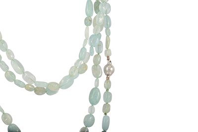 Lot 60 - A LONG AQUAMARINE BEADED NECKLACE, to a 18ct...