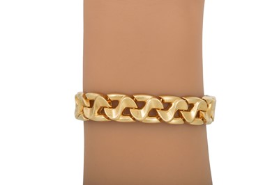 Lot 345 - AN ITALIAN 18CT FLEXIBLE GOLD BRACELET, flat...