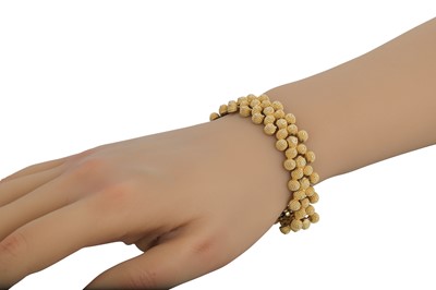 Lot 345 - AN ITALIAN 18CT FLEXIBLE GOLD BRACELET, flat...