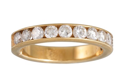 Lot 349 - A DIAMOND SET HALF ETERNITY RING, the...