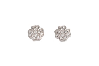 Lot 310 - A PAIR OF DIAMOND CLUSTER EARRINGS, shaped...