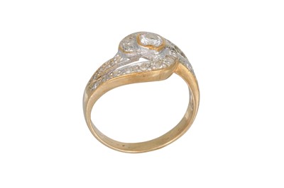 Lot 329 - A DIAMOND SET CLUSTER SWIRL RING, set with...