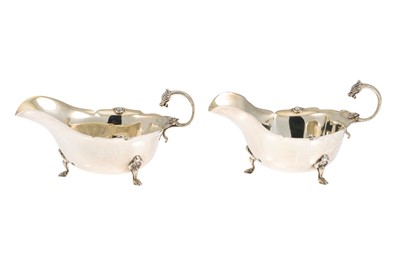 Lot 514 - A PAIR OF SILVER HELMET SHAPED SAUCE BOATS, By...