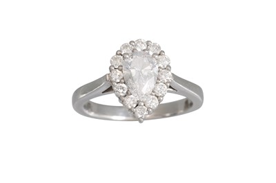 Lot 92 - A DIAMOND CLUSTER RING, the pear shaped centre...