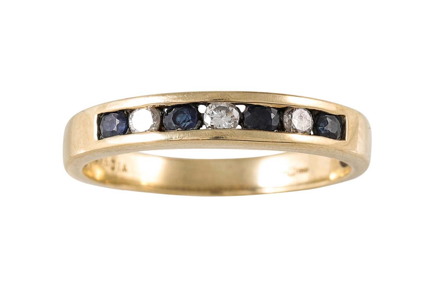 Lot 50 - A DIAMOND AND SAPPHIRE ETERNITY RING, mounted...