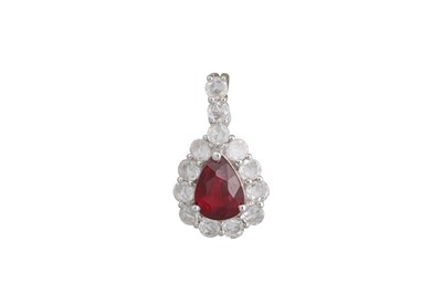Lot 312 - A RUBY AND DIAMOND SET CLUSTER DROP PENDANT,...