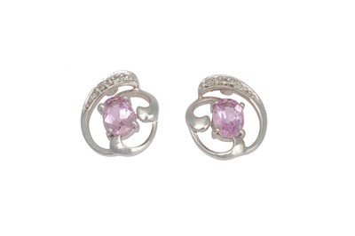 Lot 253 - A PAIR OF DIAMOND AND AMETHYST EARRINGS, set...
