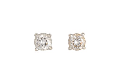 Lot 200 - A PAIR OF DIAMOND STUD EARRINGS, the round...