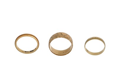 Lot 382 - THREE 18CT GOLD BANDS RINGS, 10.3 g. size P, N...