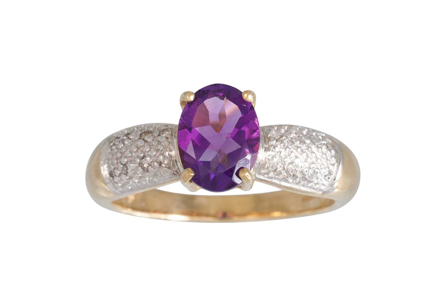 Lot 25 - A DIAMOND AND AMETHYST RING, the oval amethyst...