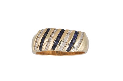 Lot 56 - A DIAMOND AND SAPPHIRE RING, set with...