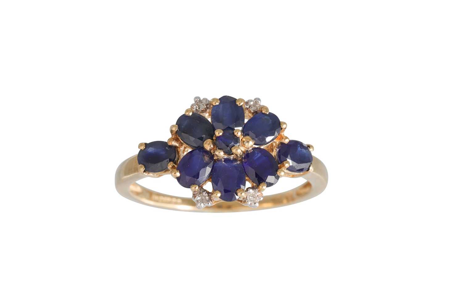 Lot 58 - A SAPPHIRE AND DIAMOND CLUSTER RING, set with...