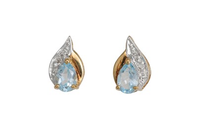 Lot 70 - A PAIR OF TOPAZ AND DIAMOND EARRINGS, mounted...