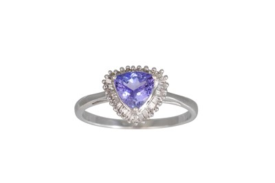 Lot 75 - A DIAMOND AND TANZANITE CLUSTER RING, the...