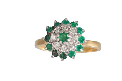 Lot 79 - A DIAMOND AND EMERALD CLUSTER RING, of...