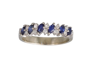 Lot 82 - A DIAMOND AND SAPPHIRE HALF ETERNITY RING, the...