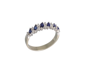 Lot 82 - A DIAMOND AND SAPPHIRE HALF ETERNITY RING, the...