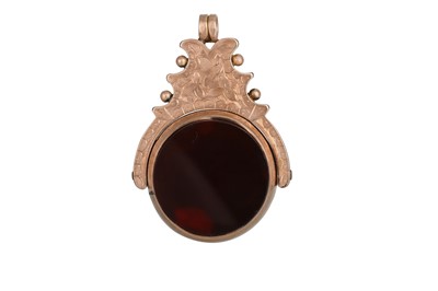 Lot 85 - AN ANTIQUE GOLD SWIVEL FOB, set with carnelian...