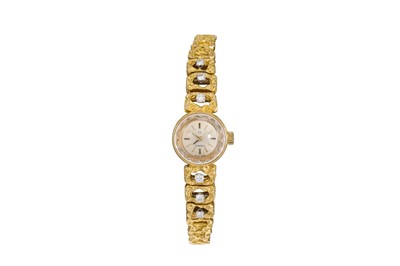 Lot 6 - A LADY'S VINTAGE 18CT GOLD OMEGA WRIST WATCH,...