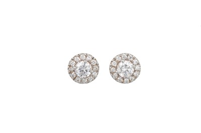 Lot 244 - A PAIR OF DIAMOND SET CLUSTER EARRINGS, the...