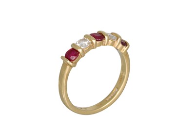 Lot 263 - A RUBY AND DIAMOND FIVE STONE RING, mounted in...