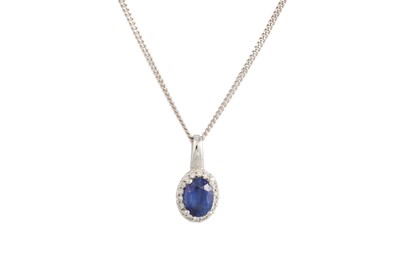 Lot 272 - A SAPPHIRE AND DIAMOND OVAL CLUSTER PENDANT,...