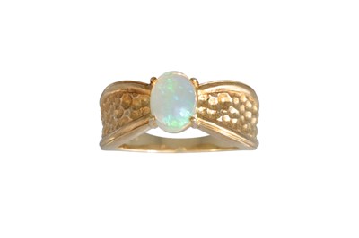 Lot 346 - AN OPAL RING, to a textured 9ct gold band,...