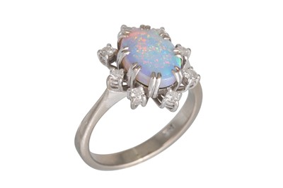 Lot 282 - AN OPAL AND DIAMOND CLUSTER RING, the dark...