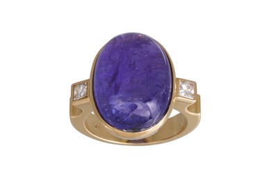 Lot 296 - A TANZANITE AND DIAMOND RING, the large...