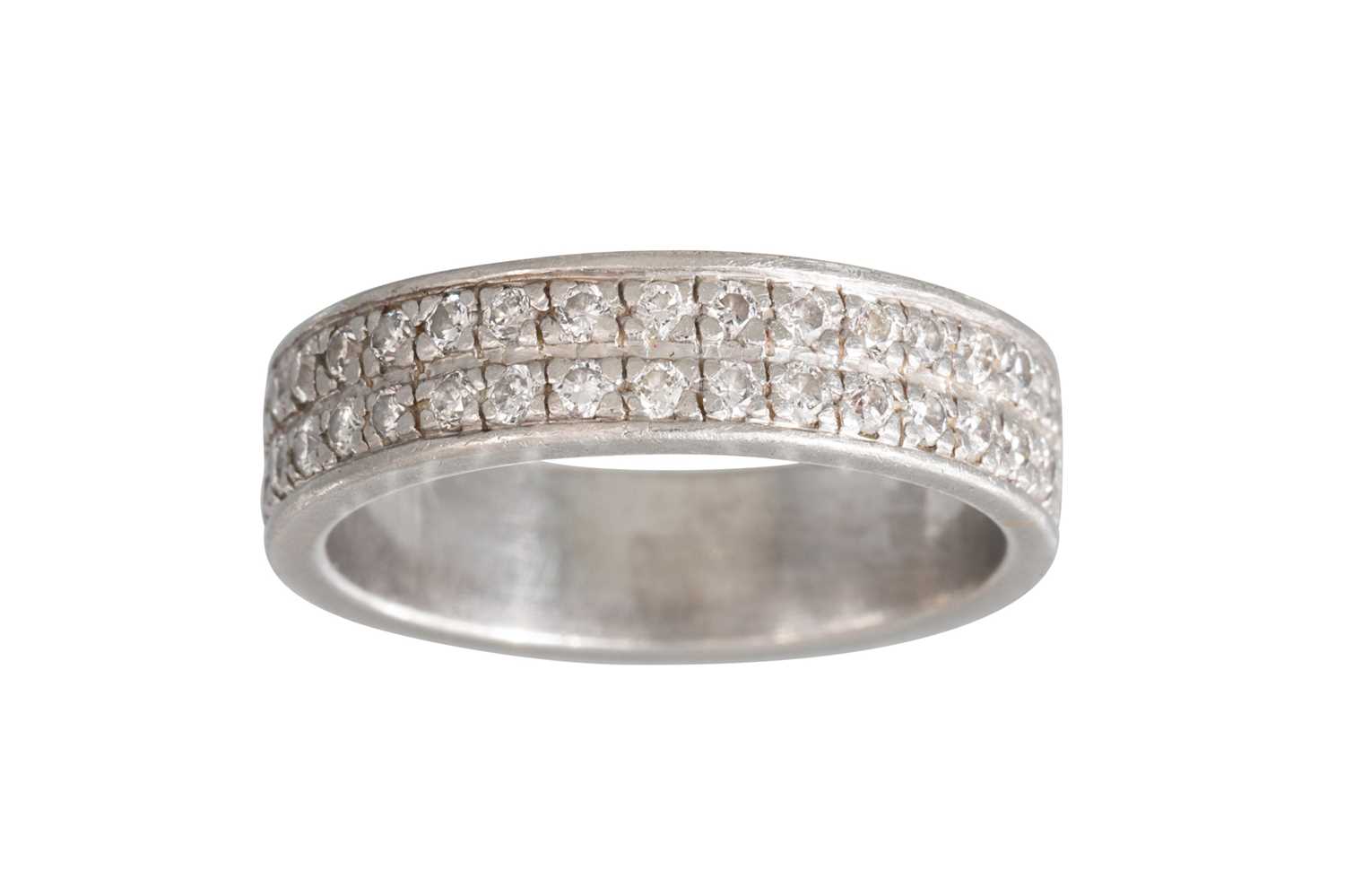 Lot 297 - A TWO ROWED DIAMOND ETERNITY RING, mounted in...