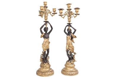 Lot 453 - A MODERN PAIR OF FOUR BRANCH CANDELABRA, with...