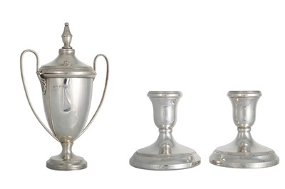Lot 506 - A MODERN PAIR OF SILVER DWARF LIBRARY...