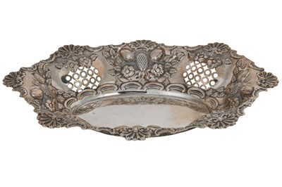 Lot 456 - AN EDWARDIAN EMBOSSED AND PIERCED SILVER BREAD...